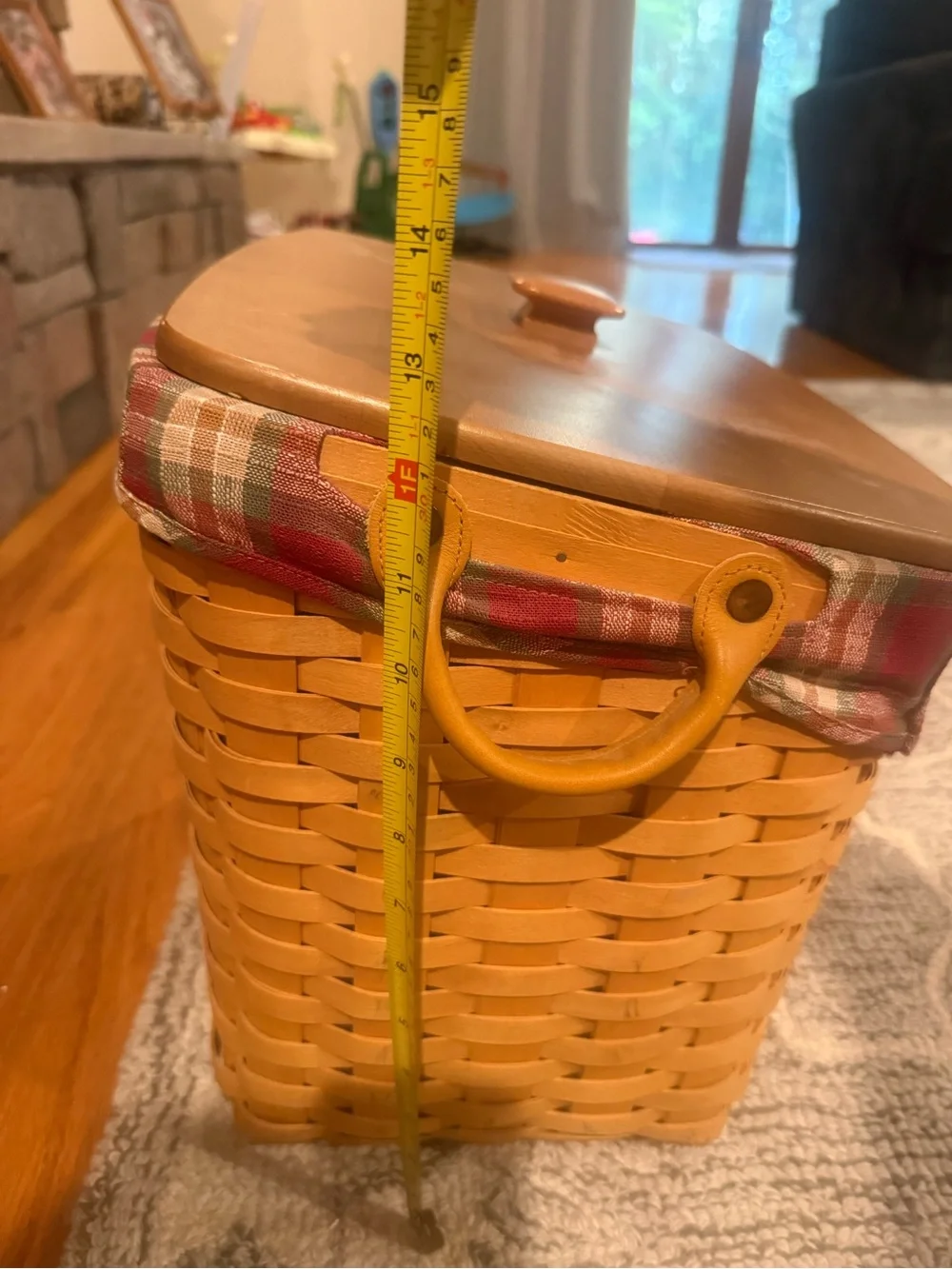Longaberger newspaper basket. With lid , liner and wrought iron stand